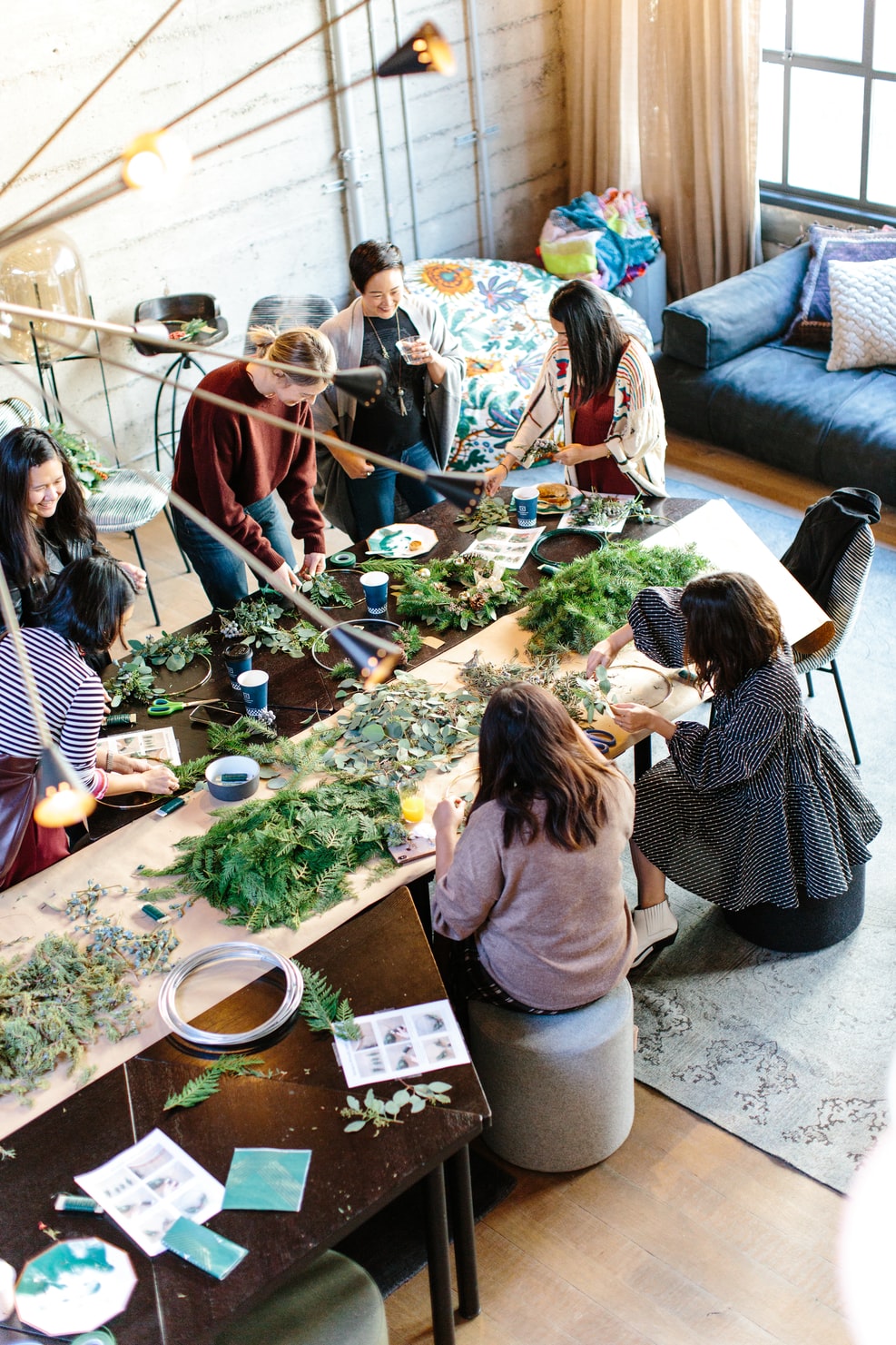 Colleagues collaborating around a table in a bright workspace